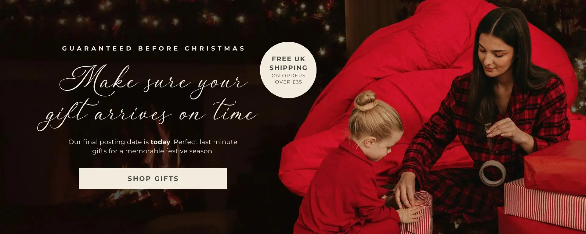 Mother and child in matching red festive pyjamas